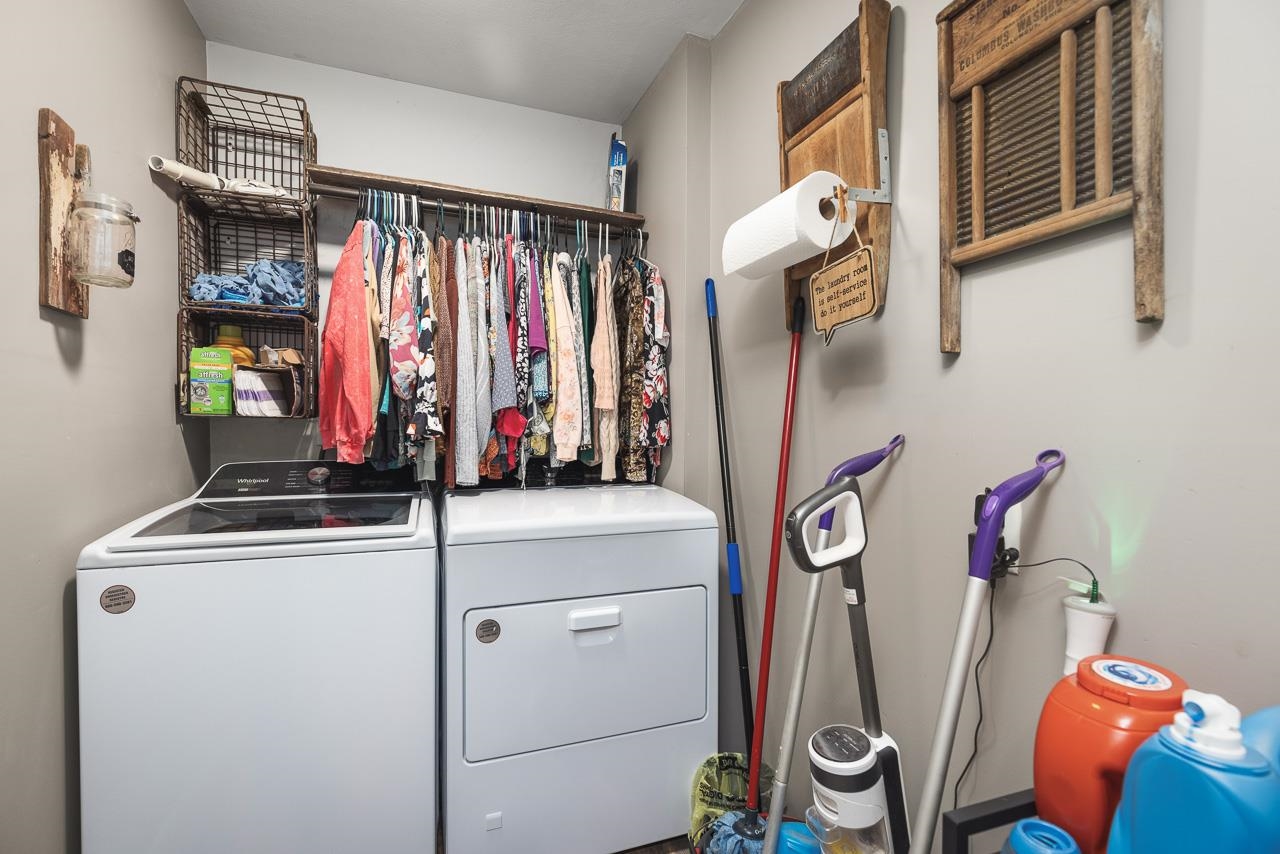 7785 Prairie Hill Road South Beloit, IL 61080 - Photo 20 of 46 a view of walk in closet with clothes and shoes