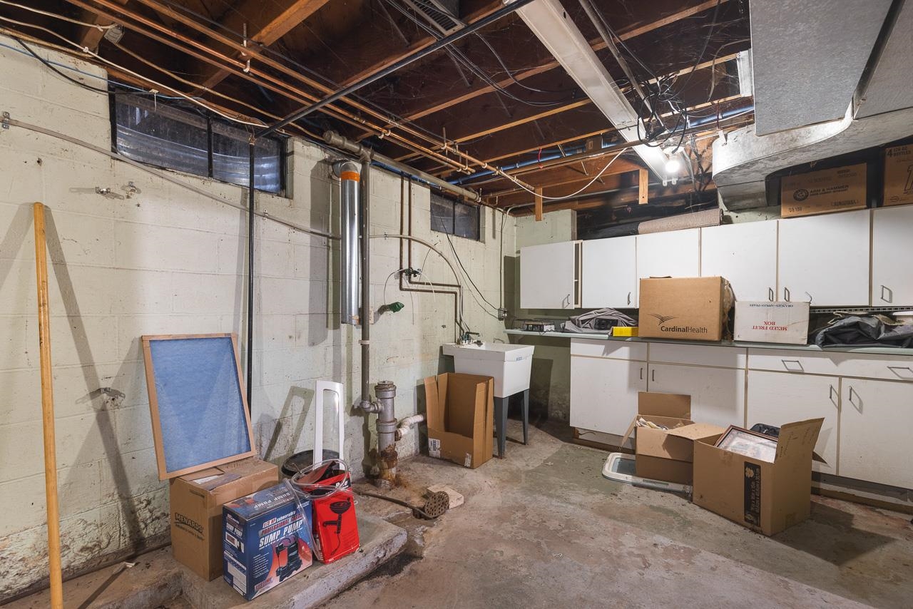 7785 Prairie Hill Road South Beloit, IL 61080 - Photo 33 of 46 a view of storage and utility room with racks
