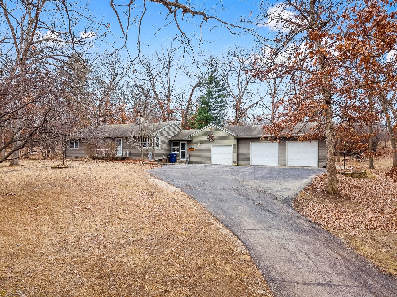 7785 Prairie Hill Road South Beloit, IL 61080 - Photo 35 of 46 front view of a house with a trees