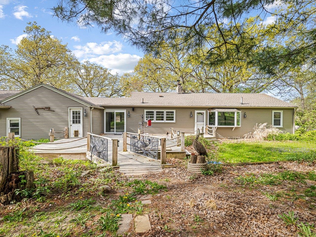 7785 Prairie Hill Road South Beloit, IL 61080 - Photo 6 of 46 a view of a house with backyard and sitting area