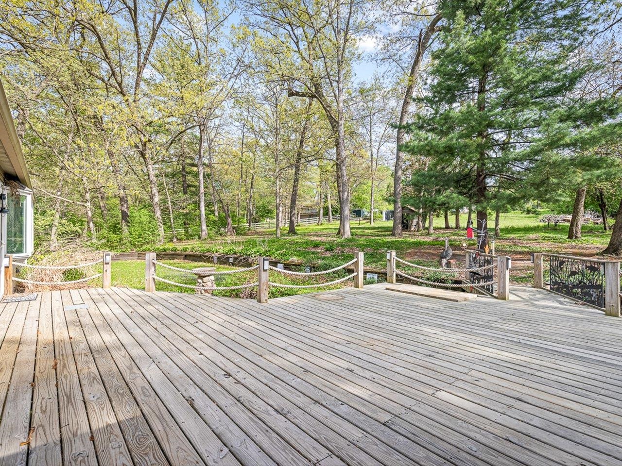 7785 Prairie Hill Road South Beloit, IL 61080 - Photo 7 of 46 a view of a swimming pool with a patio