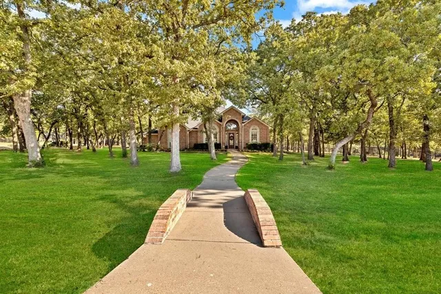 a view of yard with swimming pool