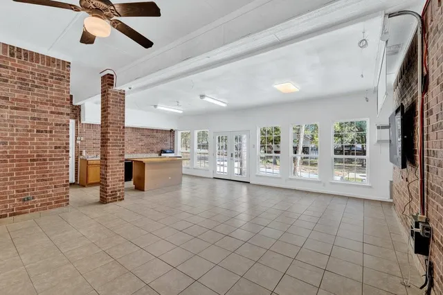 a view of a kitchen with appliances and cabinets