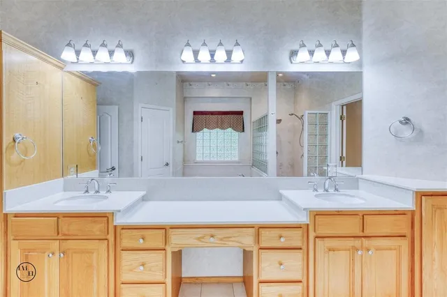 a spacious bathroom with a bathtub and a shower