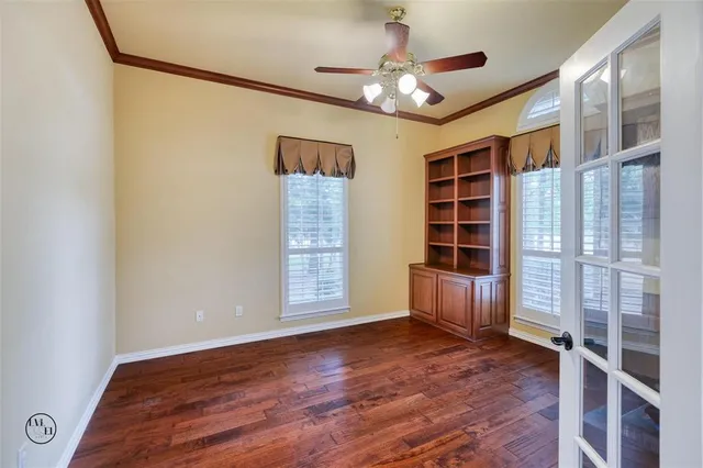 a living room with fireplace furniture and a window
