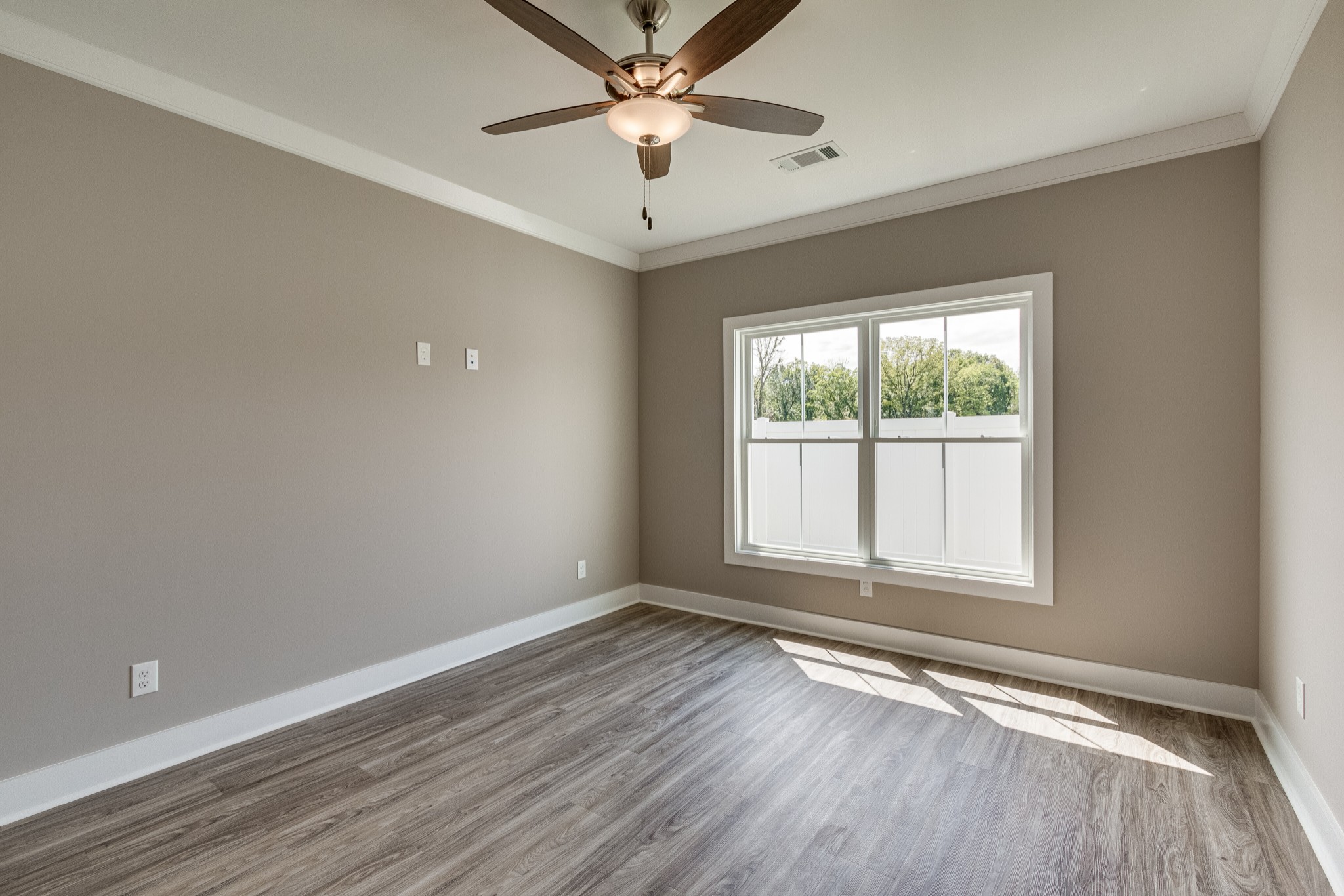 1905 Windhelm Drive Murfreesboro, TN 37129 - Photo 15 of 42 wooden floor in an empty room with a window