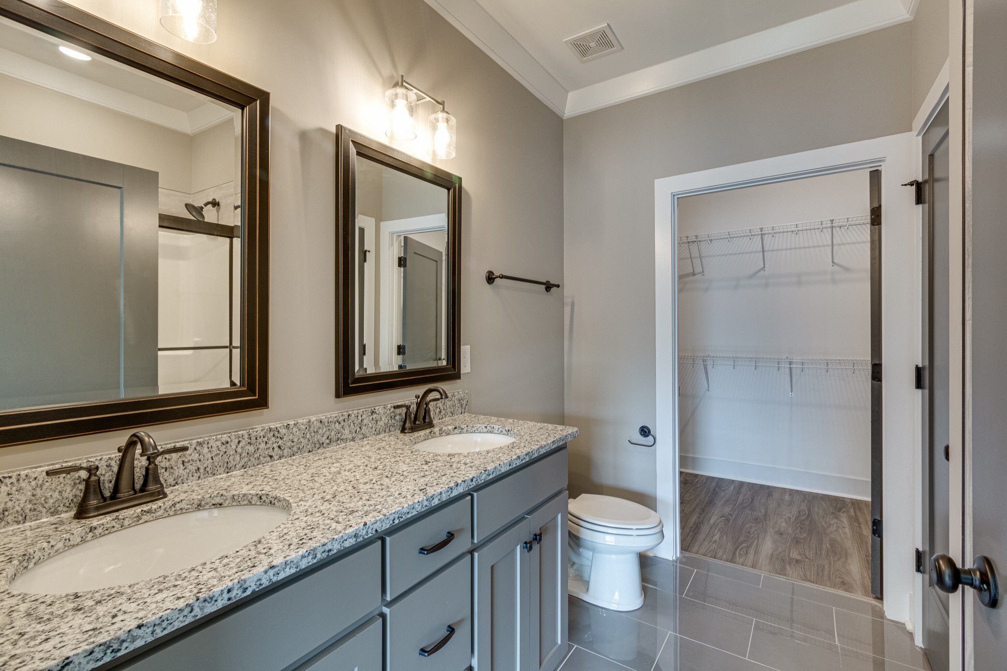 1905 Windhelm Drive Murfreesboro, TN 37129 - Photo 17 of 42 a bathroom with a granite countertop sink toilet and shower