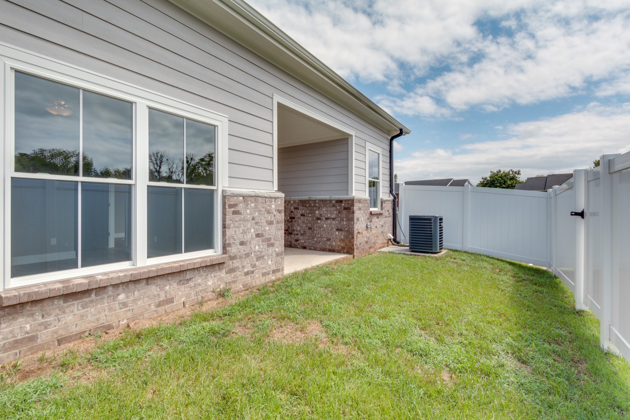 1905 Windhelm Drive Murfreesboro, TN 37129 - Photo 21 of 42 a view of a backyard with a garden and entryway