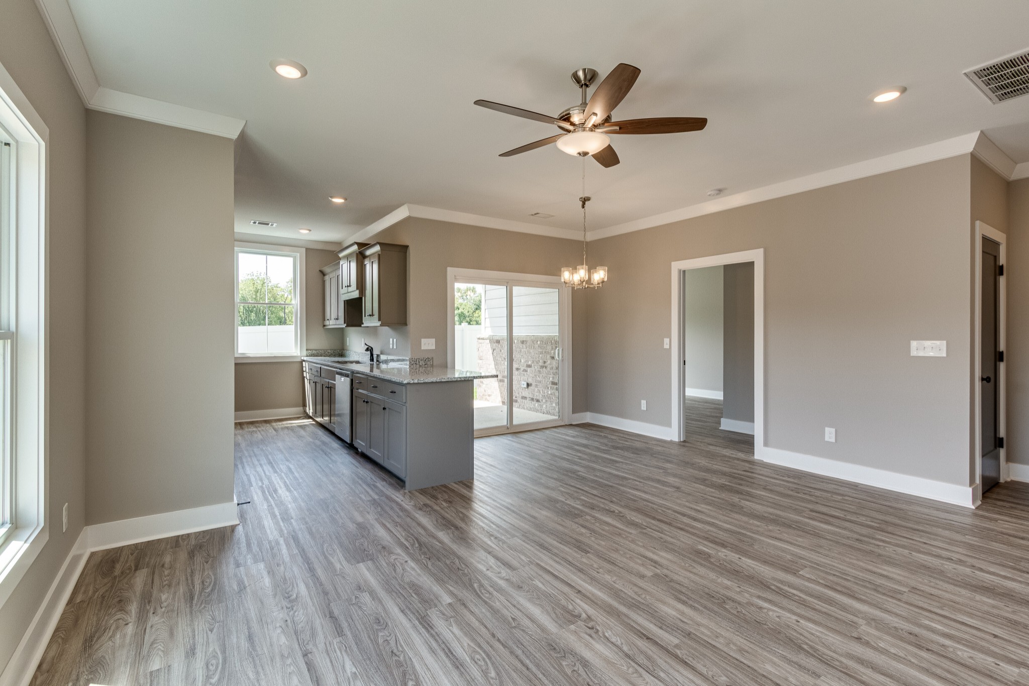 1905 Windhelm Drive Murfreesboro, TN 37129 - Photo 8 of 42 a view of a kitchen with a sink and wooden floor