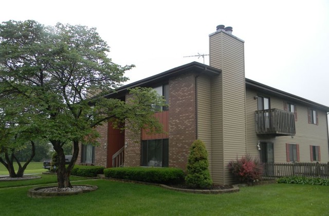 993 Kane Street, Unit 993 South Elgin, IL 60177 - Photo 1 of 15 front view of a house with a yard