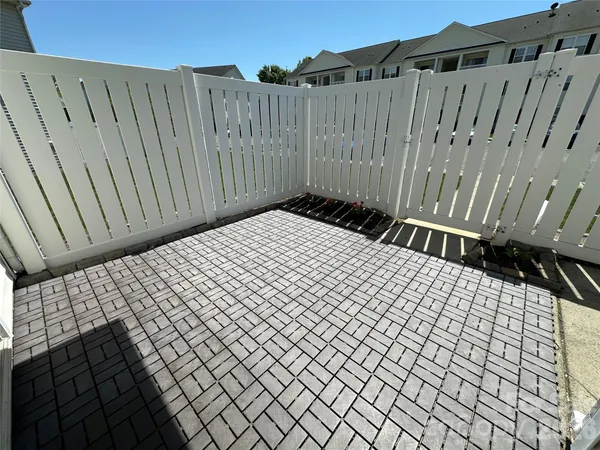 a bathroom with a sink mirror vanity and toilet