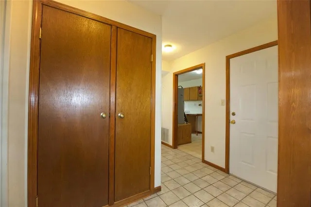 a view of a bathroom from a hallway