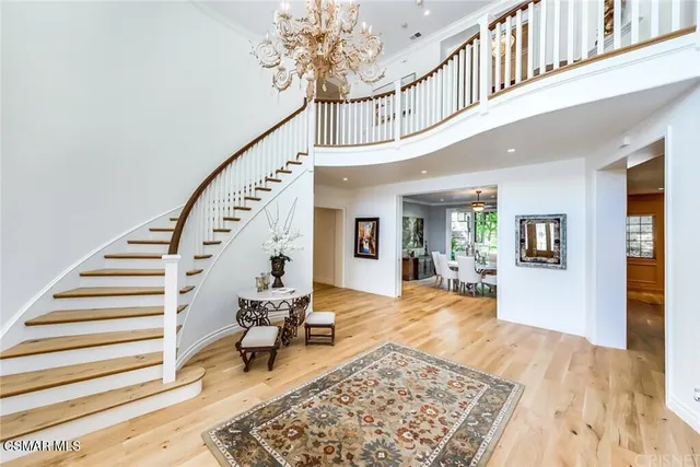 a view of entryway livingroom and hall