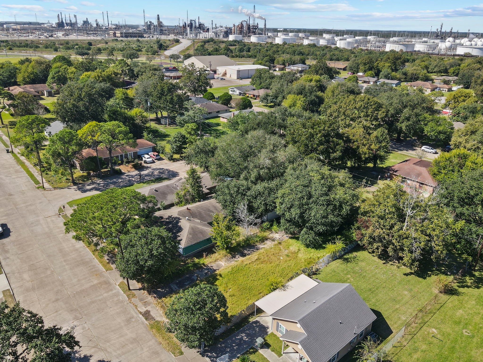 0 West 18th Street Port Arthur, TX 77640 - Photo 14 of 15 an aerial view of a house with a yard