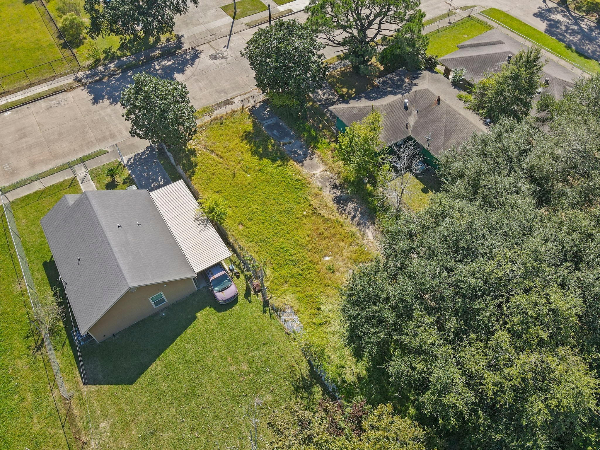 0 West 18th Street Port Arthur, TX 77640 - Photo 15 of 15 an aerial view of a house with pool outdoor seating and yard