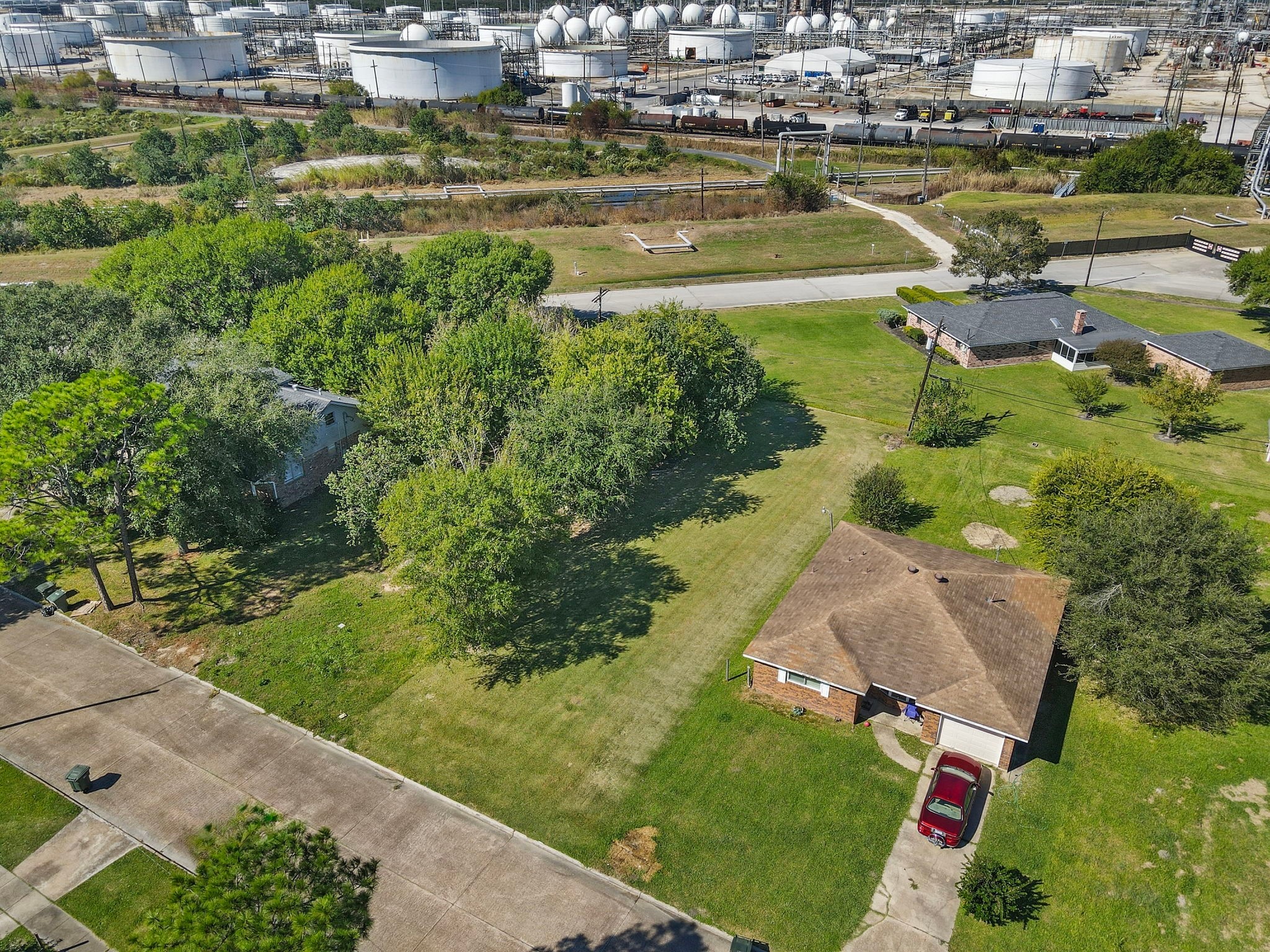 0 West 18th Street Port Arthur, TX 77640 - Photo 5 of 15 an aerial view of a residential houses with outdoor space and swimming pool