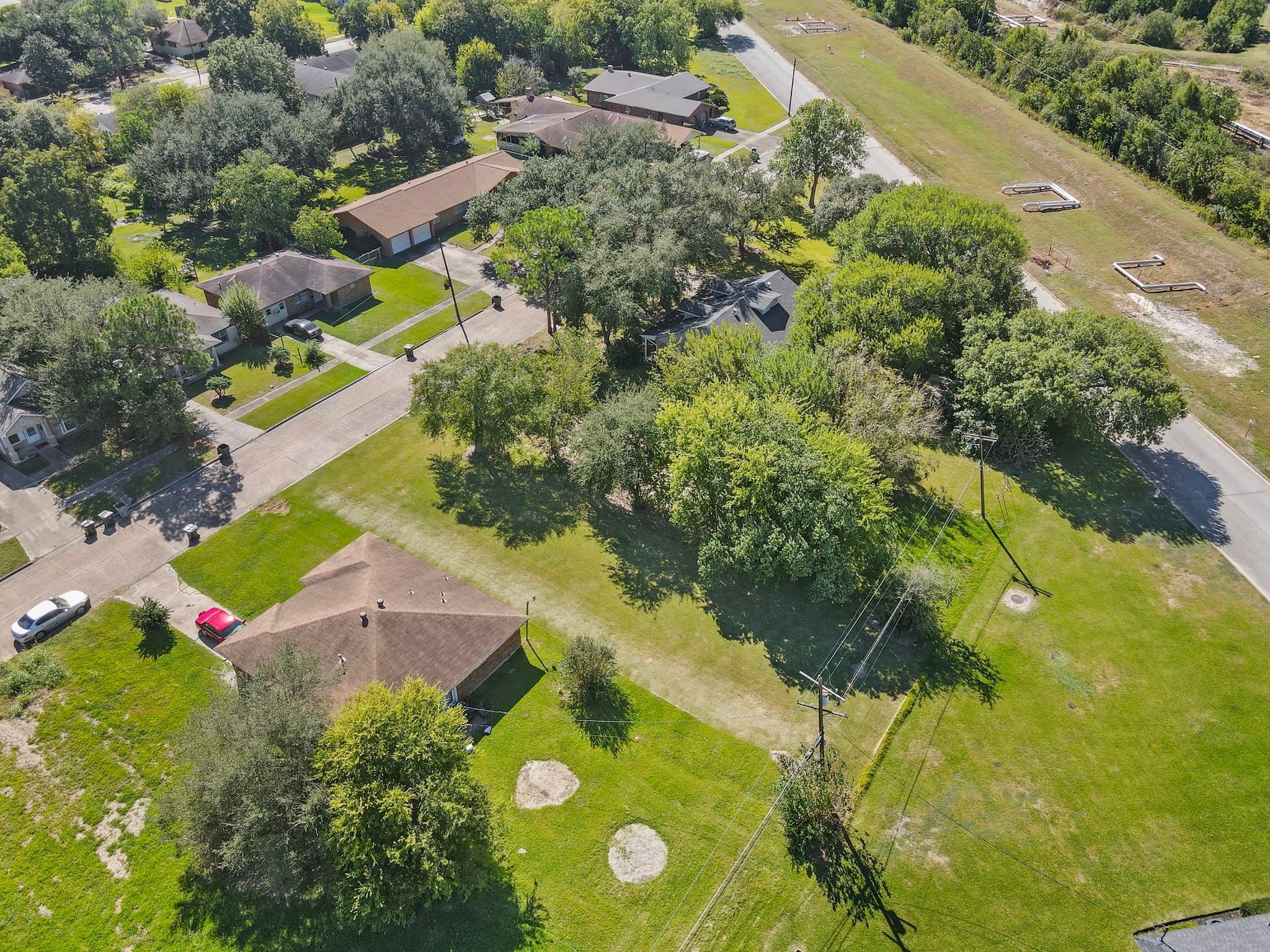 0 West 18th Street Port Arthur, TX 77640 - Photo 6 of 15 an aerial view of a residential houses with yard