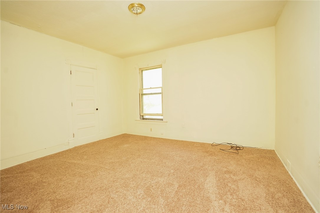 1720 Jacobs Road Youngstown, OH 44505 - Photo 9 of 18 Unfurnished room featuring carpet flooring