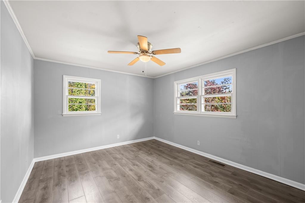 574 South Sage Street Toccoa, GA 30577 - Photo 21 of 44 a view of an empty room with a window
