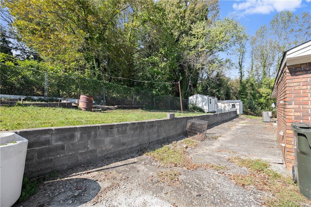 574 South Sage Street Toccoa, GA 30577 - Photo 29 of 44 a view of a yard with large trees