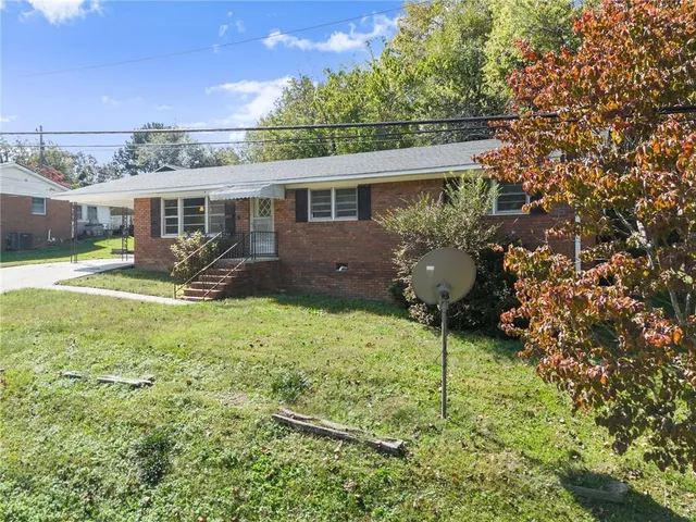 a house view with a garden space