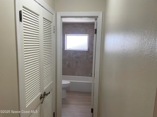 a bathroom with a toilet