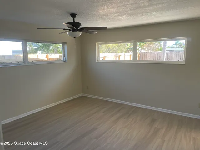 an empty room that has a window