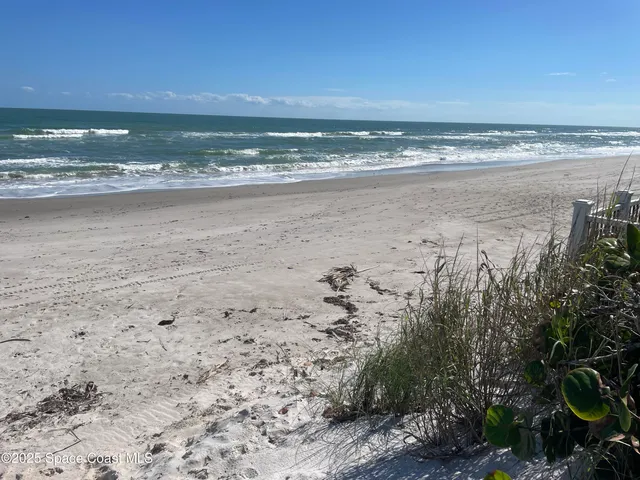 a view of an ocean beach