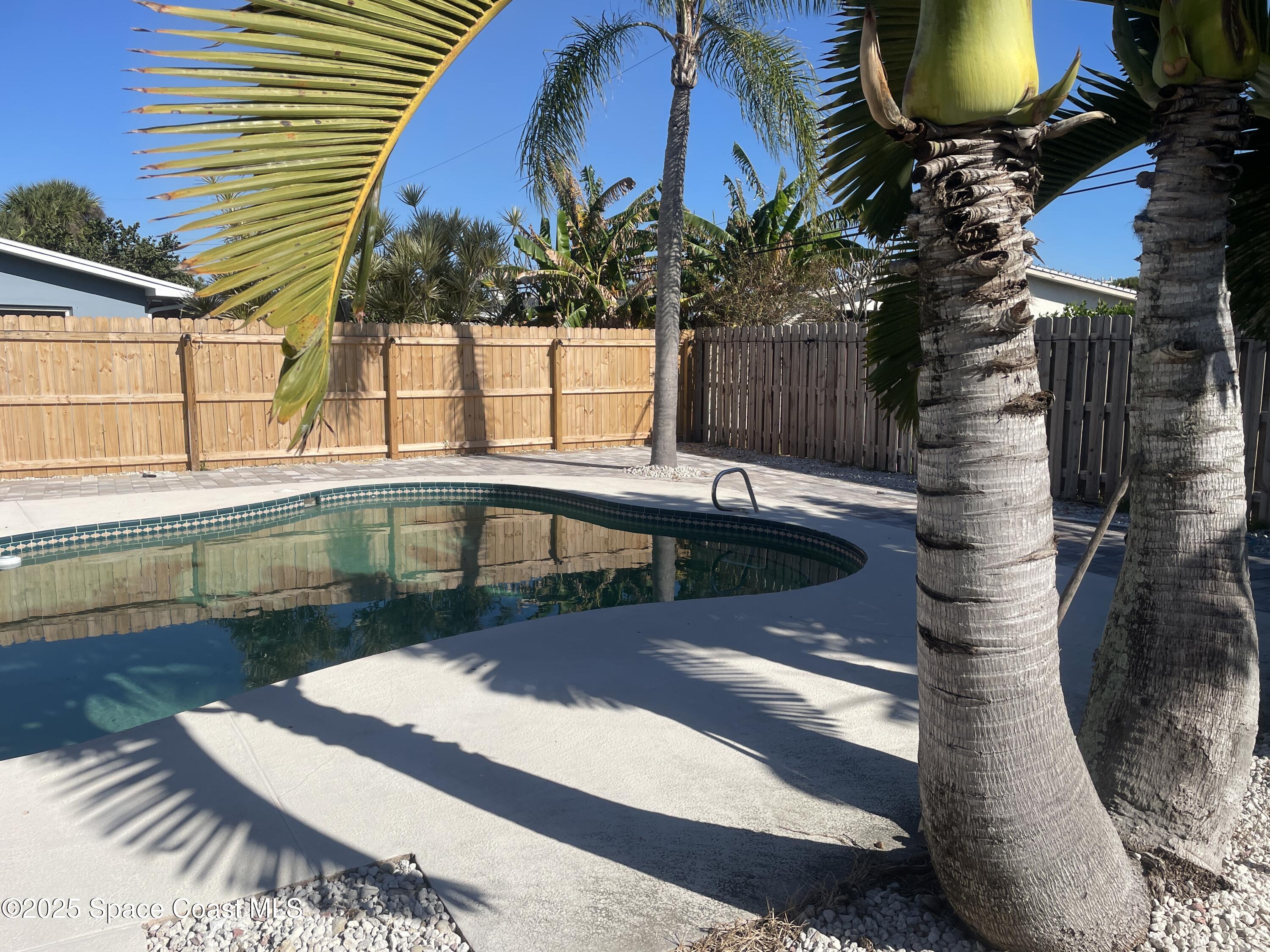 104 Jupiter Court Indialantic, FL 32903 - Photo 4 of 28 a bathroom with a sink and a mirror