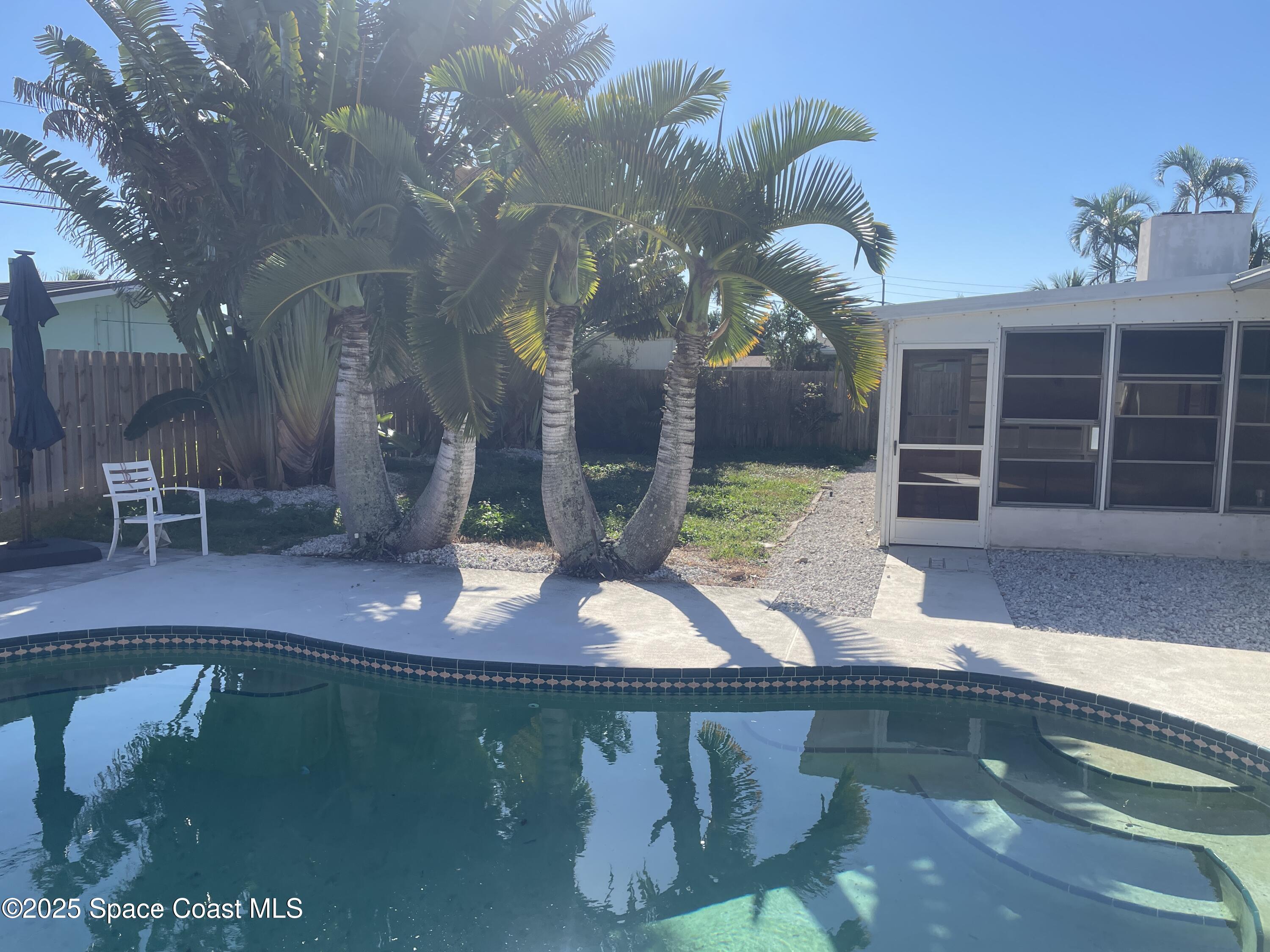 104 Jupiter Court Indialantic, FL 32903 - Photo 5 of 28 a view of a house with backyard
