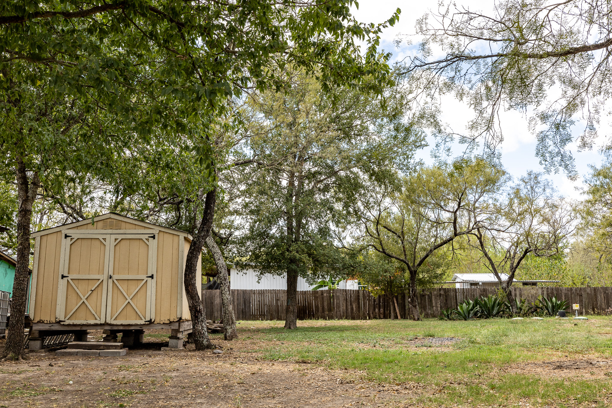 310 Union Hill Road Luling, TX 78648 - Photo 11 of 19 a front view of house with yard space and trees
