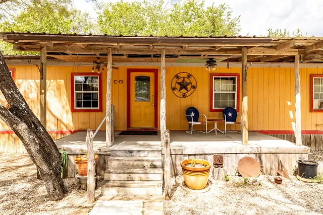a view of a door and chair in the house