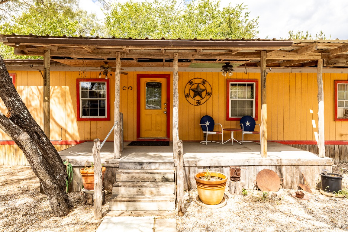 310 Union Hill Road Luling, TX 78648 - Photo 4 of 19 a view of a door and chair in the house