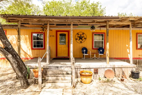 a view of a door and chair in the house
