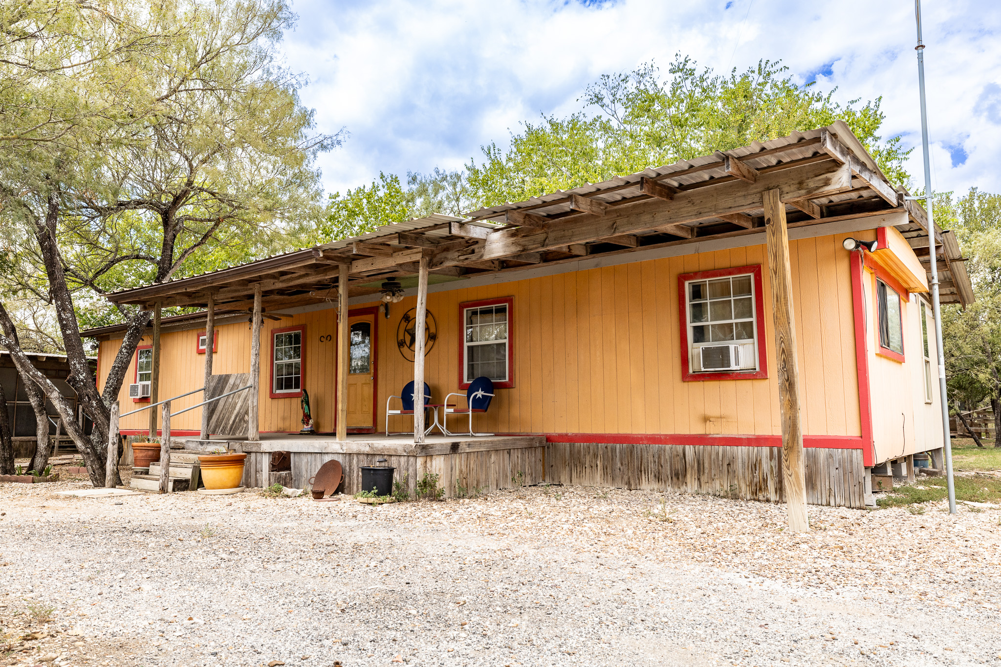 310 Union Hill Road Luling, TX 78648 - Photo 5 of 19 a front view of a house with a yard