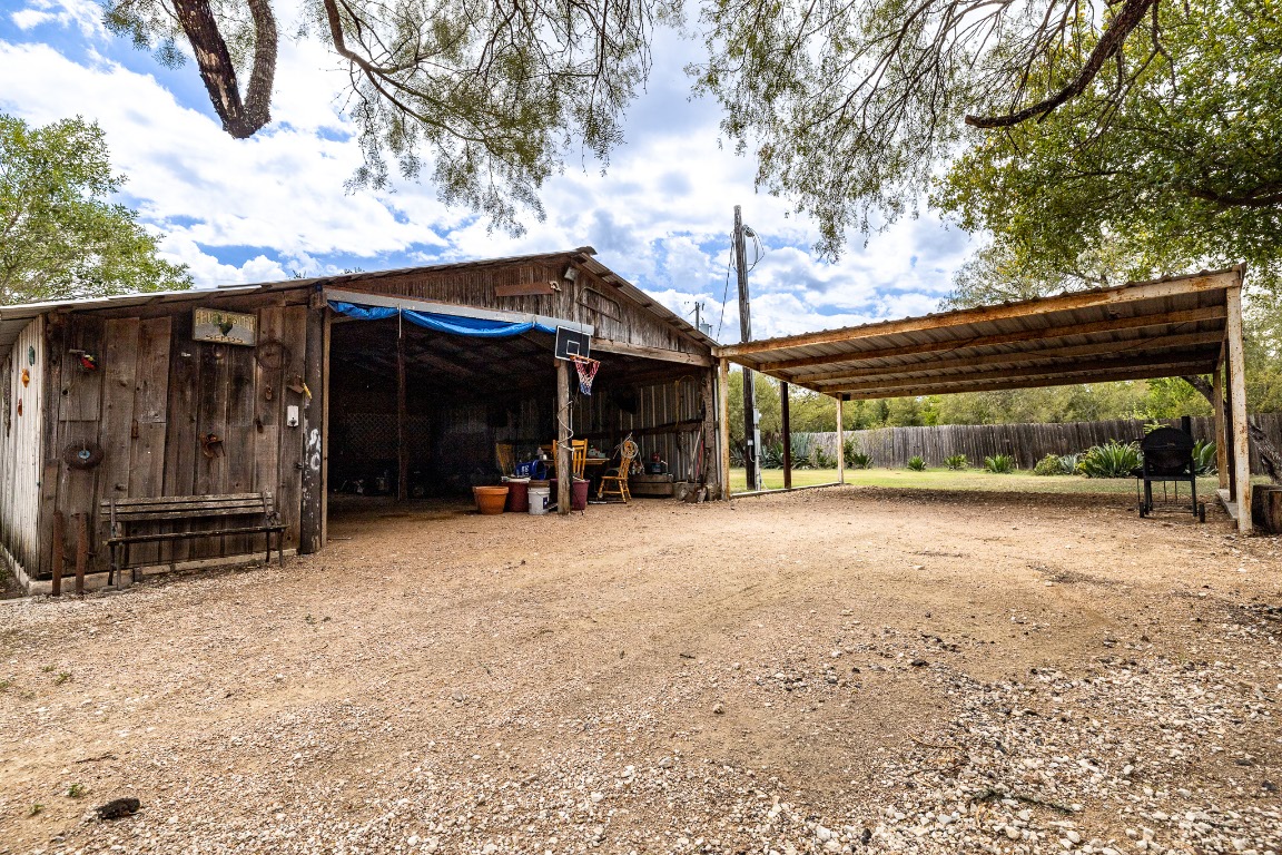 310 Union Hill Road Luling, TX 78648 - Photo 6 of 19 a view of a house with backyard and porch