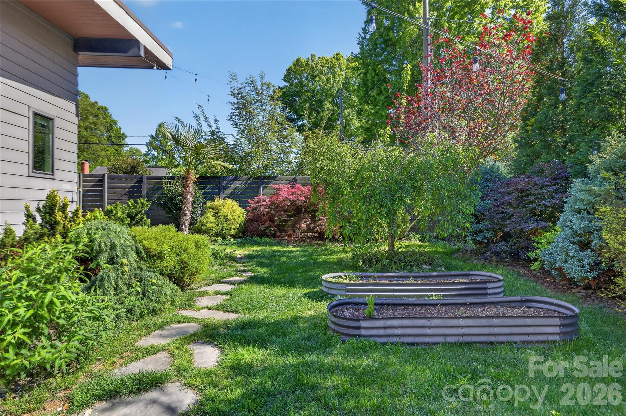 4438 Raney Way Charlotte, NC 28205 - Photo 30 of 34 a garden view with a seating space