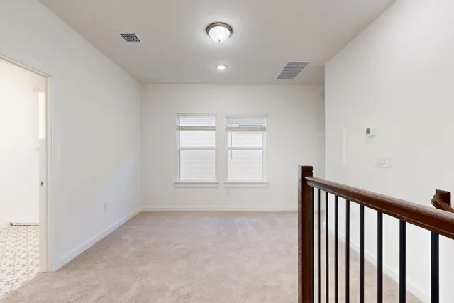 a view of empty room with a window