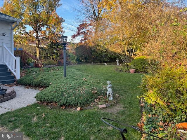 2110 Church Road, Unit B Cinnaminson, NJ 08077 - Photo 2 of 15 a view of a garden with a tree
