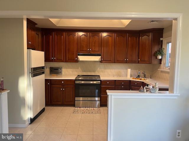 2110 Church Road, Unit B Cinnaminson, NJ 08077 - Photo 3 of 15 a kitchen with stainless steel appliances granite countertop a refrigerator stove a sink and dishwasher