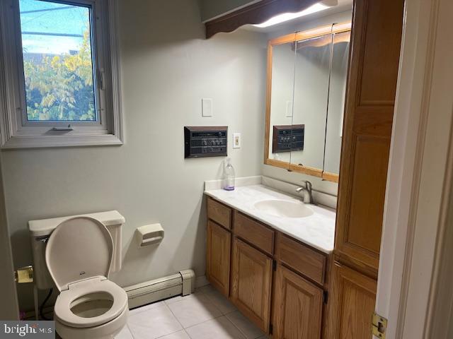 2110 Church Road, Unit B Cinnaminson, NJ 08077 - Photo 9 of 15 a bathroom with a toilet a sink and mirror