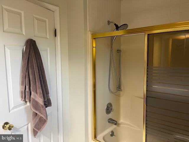 2110 Church Road, Unit B Cinnaminson, NJ 08077 - Photo 10 of 15 a bathroom with a shower and a tub