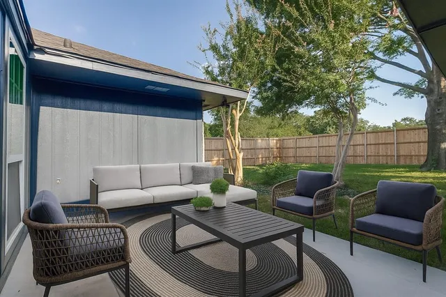 a outdoor living space with furniture and a couch