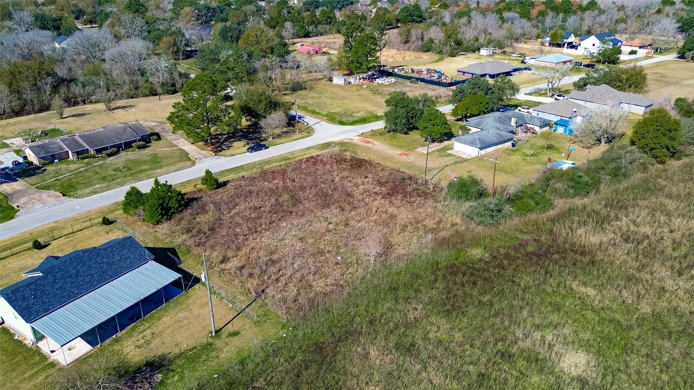 0 Ruby Street Prairie View, TX 77484 - Photo 6 of 25 an aerial view of a house with a yard and trees