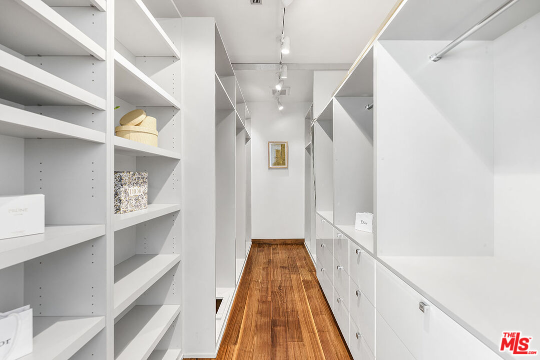 612 East Channel Road Santa Monica, CA 90402 - Photo 16 of 72 a view of a hallway with wooden floor and staircase