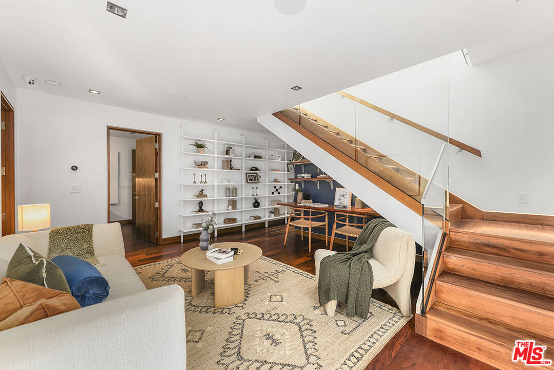 612 East Channel Road Santa Monica, CA 90402 - Photo 20 of 72 a living room with furniture and wooden floor