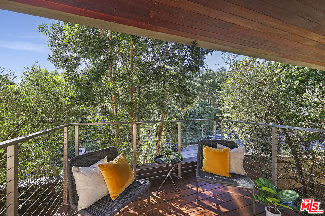 612 East Channel Road Santa Monica, CA 90402 - Photo 22 of 72 a view of a two chairs in the balcony