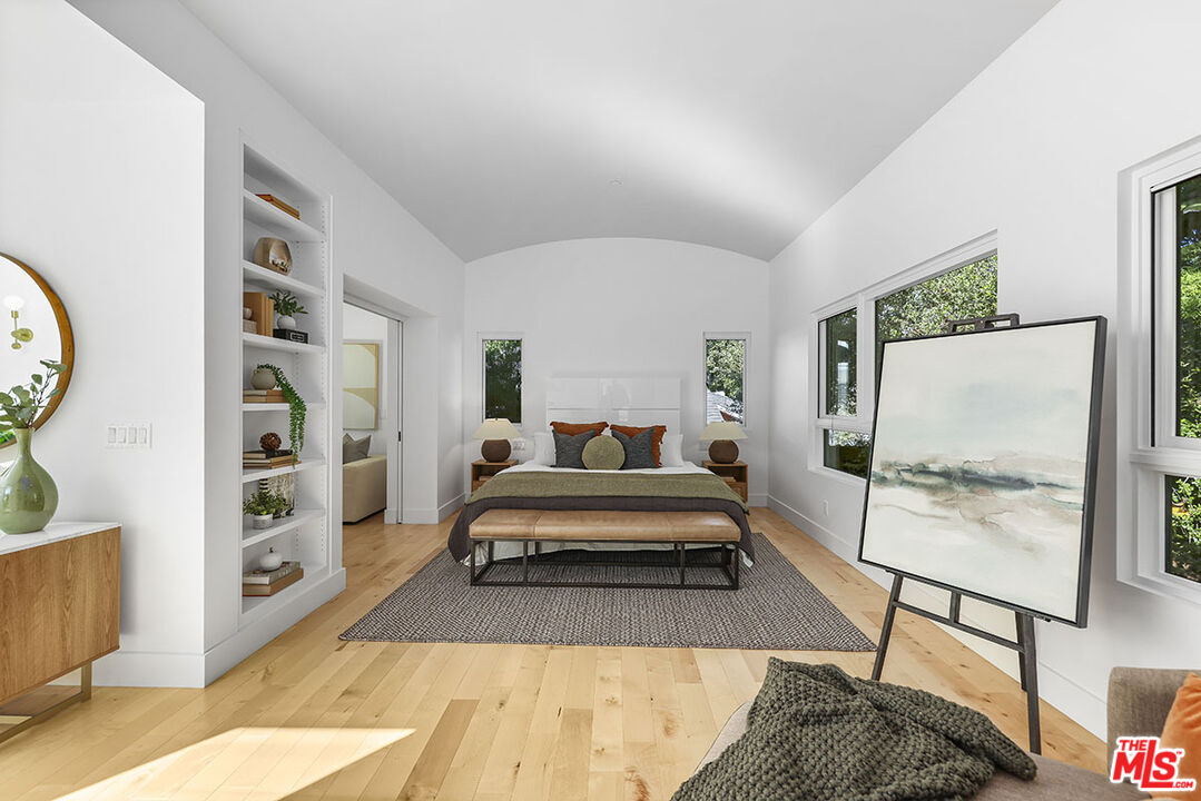 612 East Channel Road Santa Monica, CA 90402 - Photo 56 of 72 a living room with furniture a flat screen tv and a rug