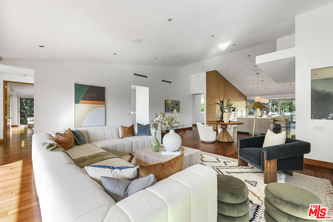 612 East Channel Road Santa Monica, CA 90402 - Photo 6 of 72 a living room with furniture and a large window