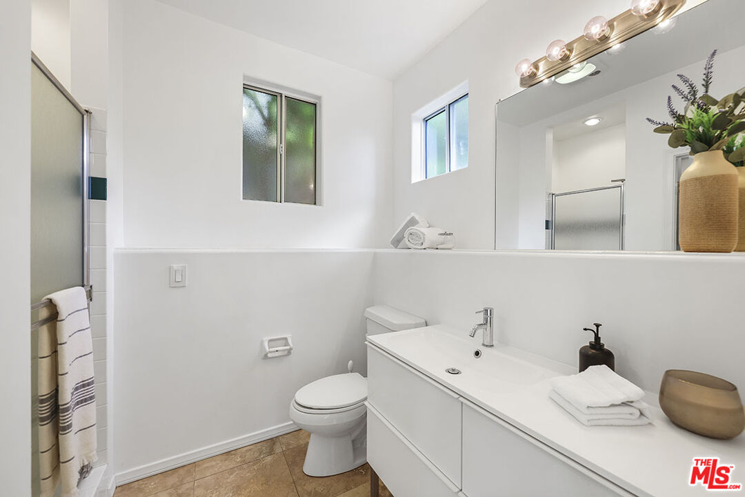 612 East Channel Road Santa Monica, CA 90402 - Photo 70 of 72 a view of bathroom with a sink and a toilet